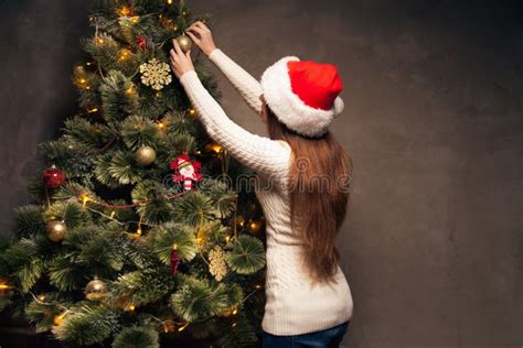 Woman Decorating Christmas Tree Outside Stock Photo Image Of Hang