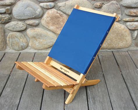 The most common wooden folding camping chair material is wood. Two Piece Portable Caravan Chair by Blue Ridge Chair