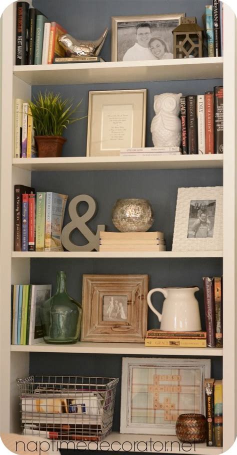 Styling Bookcases For A Much Used Family Room Mixing Pretty And Necessity Decorating
