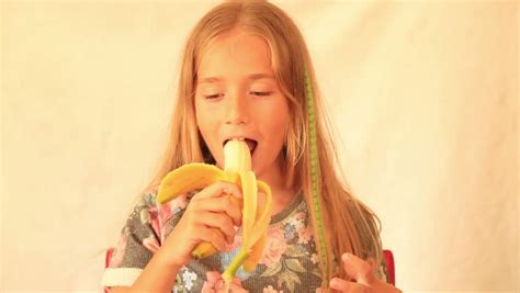 Cute Teen Girl Eating Banana Stock Footage Video 26115014 Shutterstock