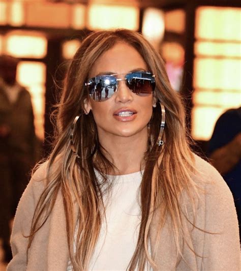 Jennifer Lopez Aviator Sunglasses And Oversized Hoop Earrings