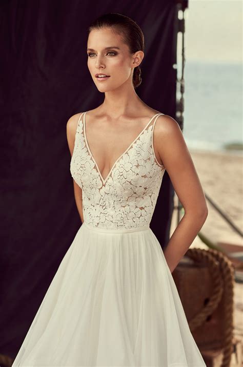 The ball gown wedding dress is a glamorous and classic option for brides. Layered Tulle Skirt Wedding Dress - Style #2191 | Mikaella ...