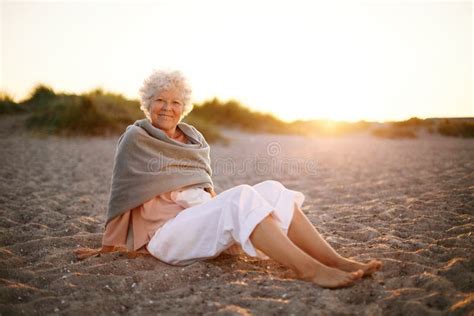 Happy Old Woman Relaxing On The Beach Stock Photo Image 39818451