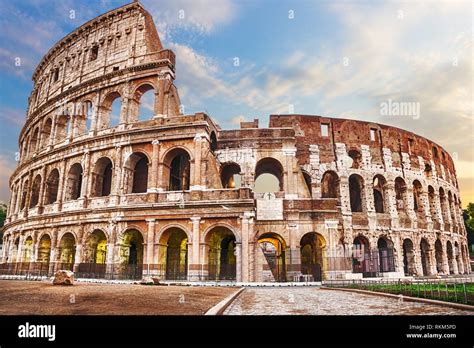 Roman Coliseum Under The Clouds Summer View With No People Stock Photo