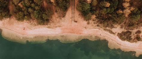 Download Wallpaper 2560x1080 Sea Coast Aerial View Sand Beach Dual