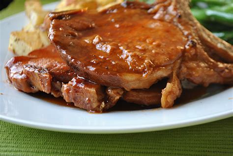 • how to cook pork chops and onion gravy in oven / pork chop recipes. Slow Cooker BBQ Pork Chops - Mac & Molly