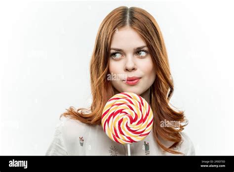 Emotional Red Haired Woman Holding Lollipop Sweets Fun Candy Stock