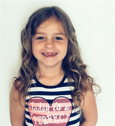 Premium Photo Portrait Of Smiling Girl Against White Background