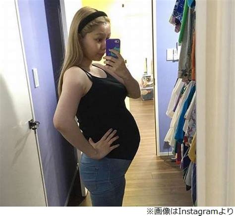 Peco Shows Off Her Nine Month Baby Bump