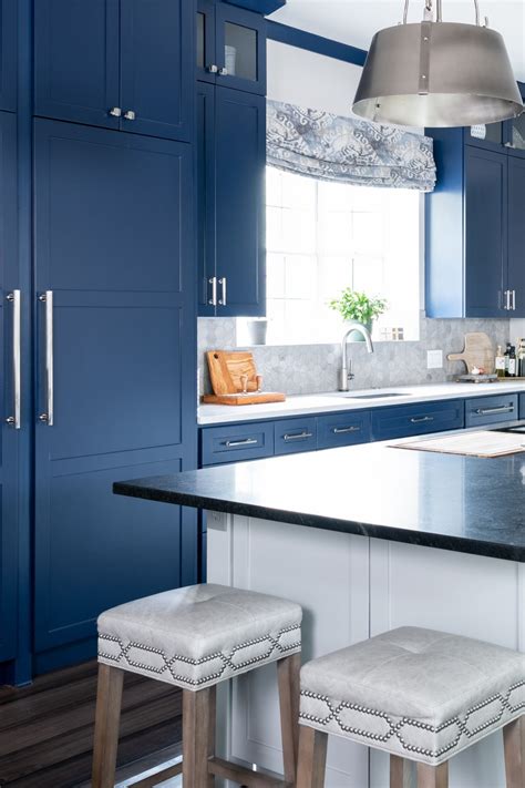 Amazing gallery of interior design and decorating ideas of white quartz countertops in laundry/mudrooms, bathrooms, kitchens by elite interior designers. Blue Kitchen Cabinets With White Countertops Design Ideas