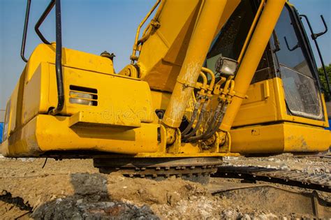 Yellow Backhoe Loader On Construction Site And Work Stock Photo Image