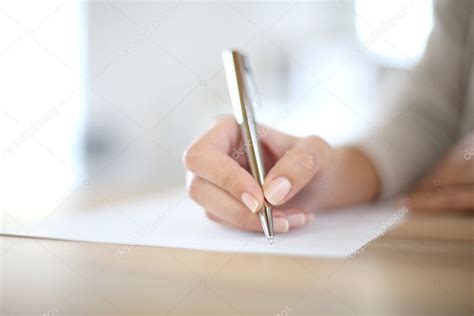 Hand Writing On Paper — Stock Photo © Goodluz 36646957