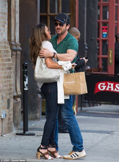 Gerard Butler Gives Brunette A Tight Hug On Their Way Into His New York Hotel Daily Mail Online