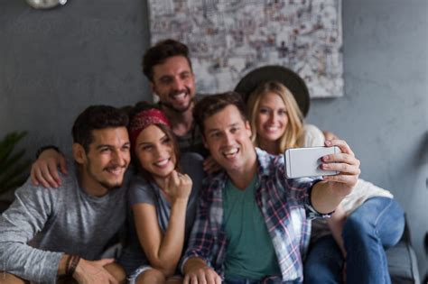 Group Of Friends Taking A Selfie By Stocksy Contributor Jovo Jovanovic Stocksy