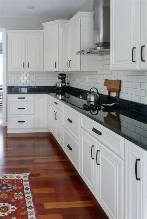 White Kitchen Cabinets With Black Countertops Contemp