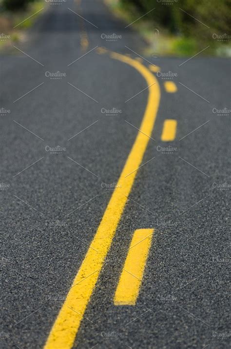 Yellow Lines On Rural Roadway Containing Road Line And Lines