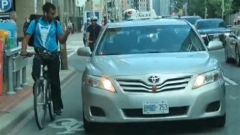 toronto taxi driver vs cyclist live leak video shows road rage incident au