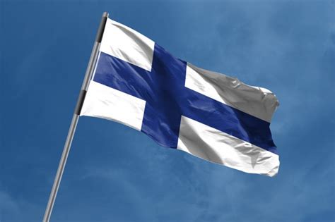 The flag features a blue cross on a white background. Finland national flag isolated 3d white background Photo ...