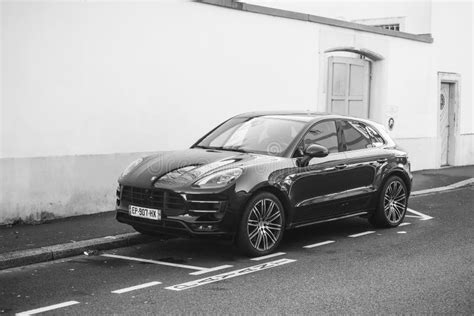 Black Porsche Macan Turbo Parked In The Street Editorial Stock Photo