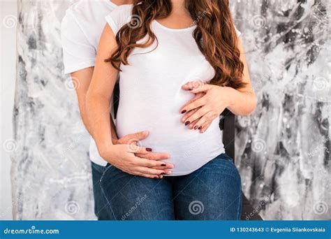 Pregnant Couple Hug And Hold Pregnant Belly Stock Image Image Of Birth Beautiful 130243643