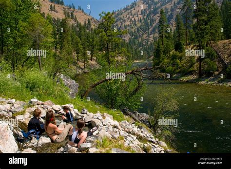 Idaho Middle Fork Of The Salmon River A Group Of People Sit In A Hot