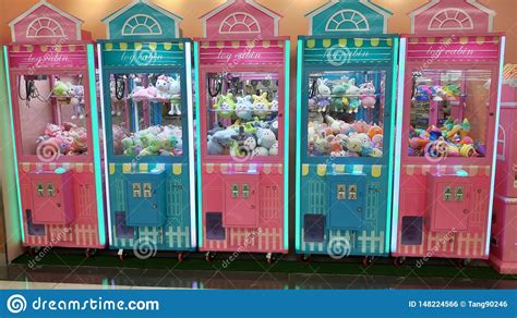 Check out our doll machine emb selection for the very best in unique or custom, handmade pieces from our shops. Row Of Toy Claw Crane Game Vending Machine Editorial Photo ...