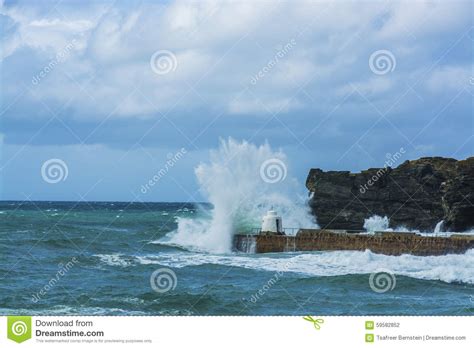 Waves Braking on Portreath Breakwater at Cornwall Stock Photo - Image