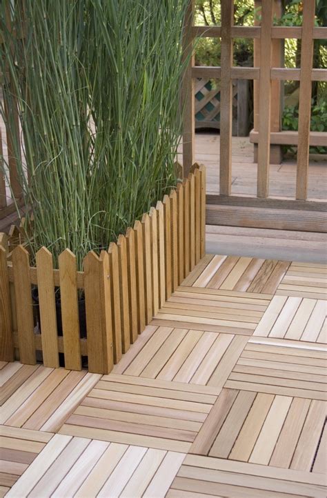 Rubberized tiles are durable and interlocking. Amazon.com : Woodway Deck Squares 10-Pack Doormat : Cedar ...