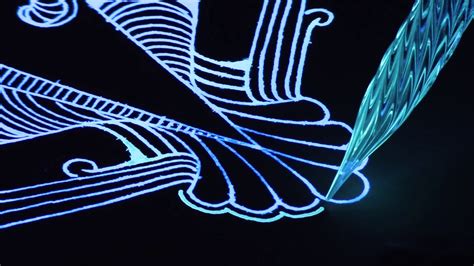 Artist Creates A Mesmerizing Glow In The Dark Drawing Using A Glass Pen