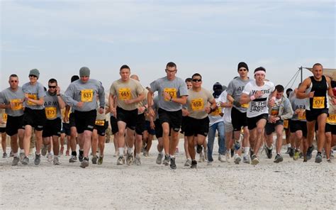 116th Soldiers Support Each Other In Army Ten Miler Shadow Run