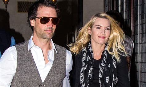 Kate and sam are saddened to announce that they. Kate Winslet holds hands with husband Ned Rocknroll during ...