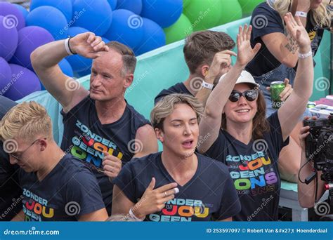 people on the lhbtiq ons avrotros boat at the gaypride canal parade with boats at amsterdam the