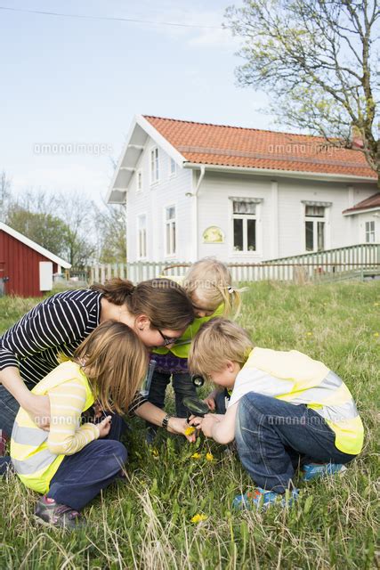 Sweden Vastergotland Olofstorp Bergum Woman Taking Care Of Children