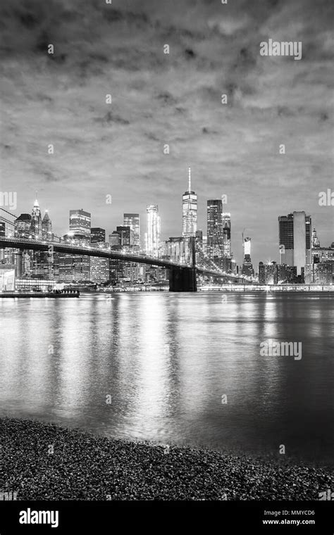 Black And White Picture Of Manhattan Waterfront At Night New York City