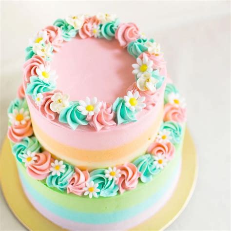 Pastel Rainbow Two Tier Cake With Fondant Daisies Tiered Cakes