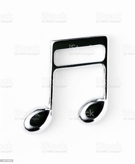 Isolated Shot Of Silver Metal Musical Note On White Background Stock