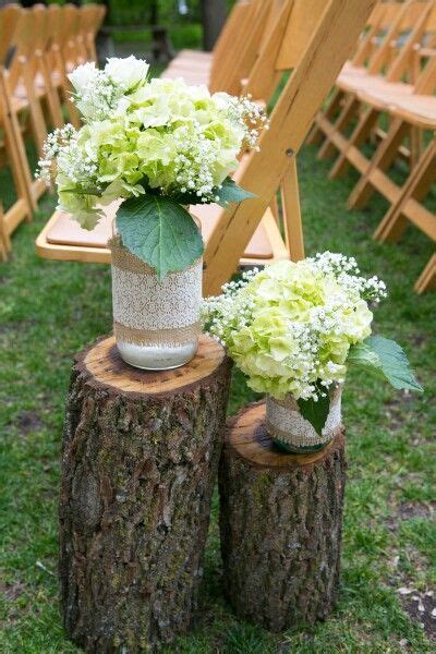 Burlap And Lace Mason Jars With Hydrangea And Babys Breath On Logs For