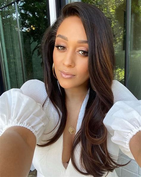 Tia Mowry Now Has Platinum Blonde Hair And Curtain Bangs Platinum Blonde Hair Hair Styles