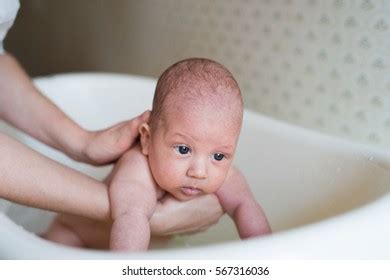 Unrecognizable Mother Bathing Her Son White Stock Photo 567316036