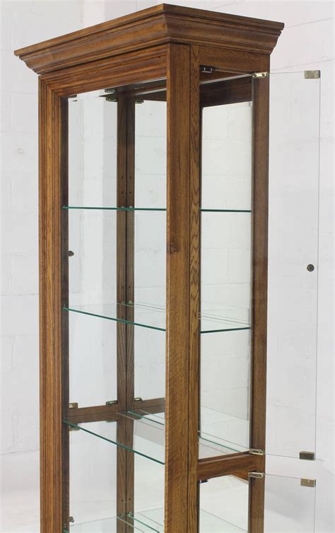 Tall Narrow Side Doors Beveled Glass Oak Curio Display Cabinet At