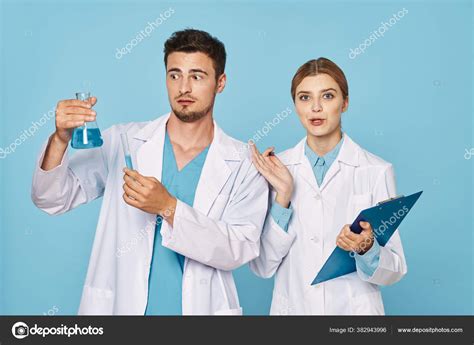Confused Young Chemistry Students Test Tubes Stock Photo By ©shotstudio
