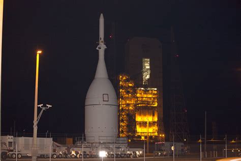 Nasas Pathfinding Orion Rolls To Launch Pad Hoisted Atop Rocket For