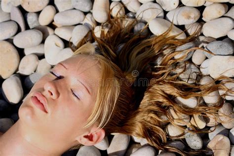 Beautiful Womans Head On A Peble Beach Stock Photo Image Of Head