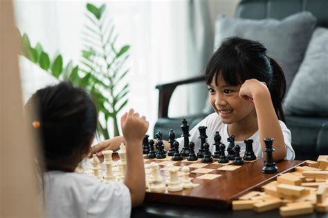 Two Cute Children Playing Chess At Home 8427518 Stock Photo At Vecteezy