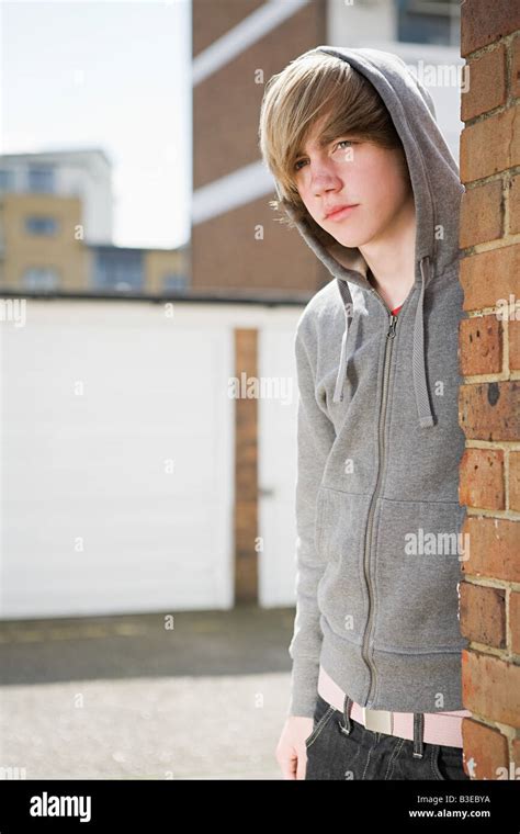 Teenage Boy In A Hoodie Stock Photo Alamy