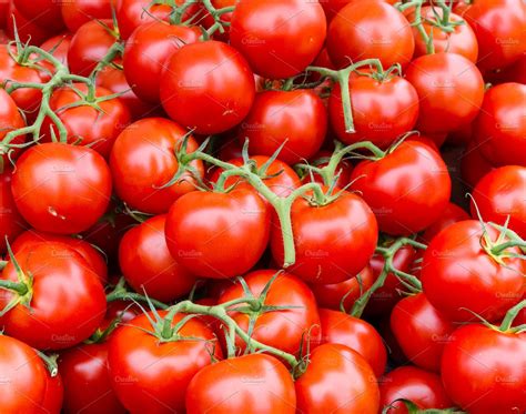 Red Ripe Tomatoes On Stems High Quality Food Images ~ Creative Market