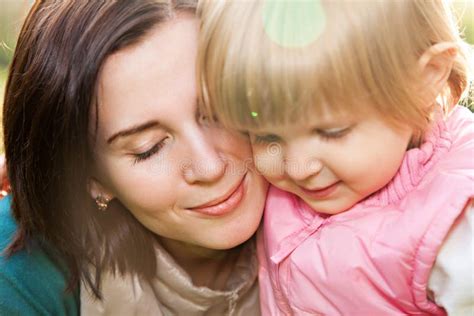 Gentle Embrace Between Young Woman And Daughter Stock Image Image Of Expressing Little 42044451