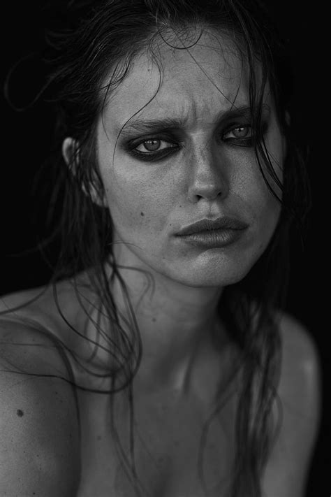 Black And White Photograph Of A Woman With Wet Hair