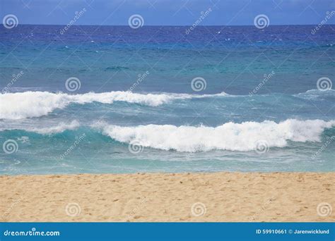 Blue Waters And Waves On A Hawaiian Beach On Sunny Day Stock Image