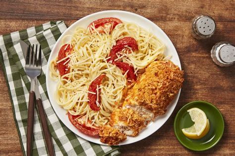 Add garlic and cook until tender. Parmesan-Crusted Chicken with Creamy Lemon Tomato ...